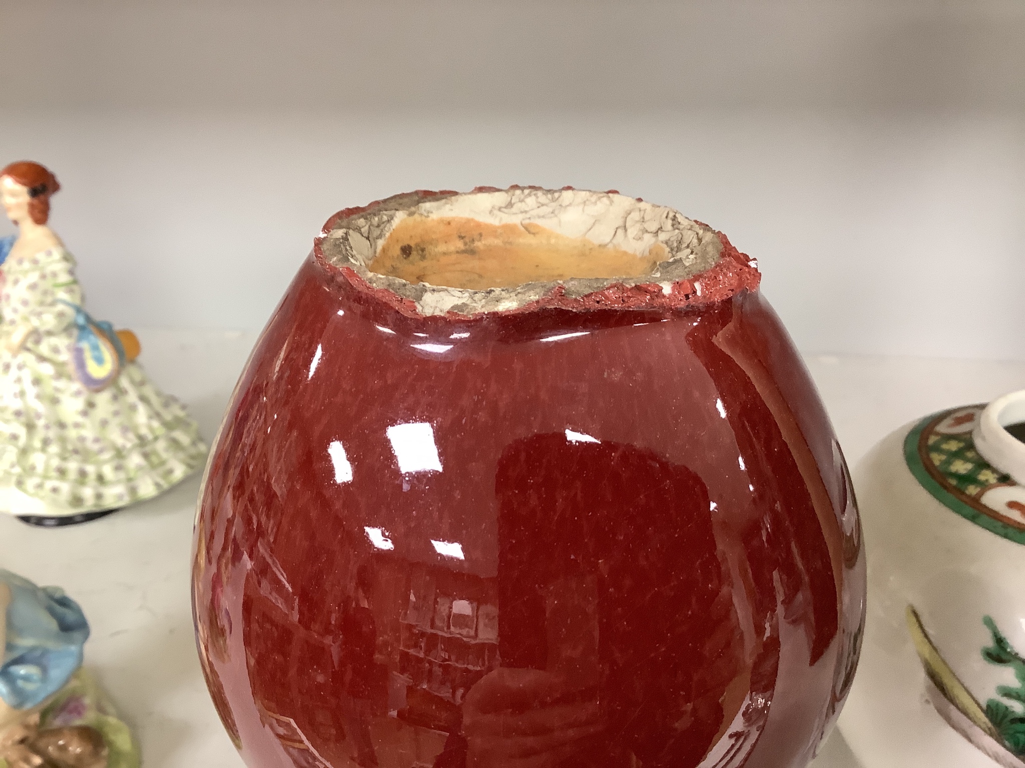 A Chinese famille verte jar and a sang de boeuf vase